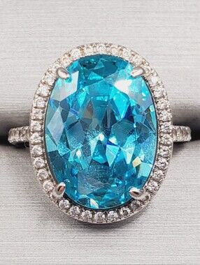 Blue Topaz Oval Halo Cocktail Ring with Pavé Accents - 925 Sterling Silver